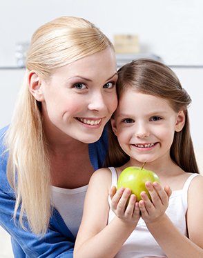 Mother and daughter with healthy smiles — new patients welcome in Chanhassen, MN